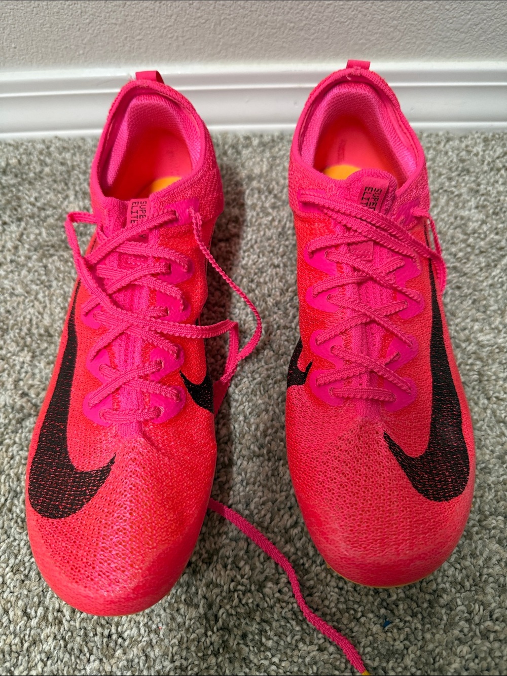 Nike Women's Hot Pink Athletic Running Shoes with Black Swoosh